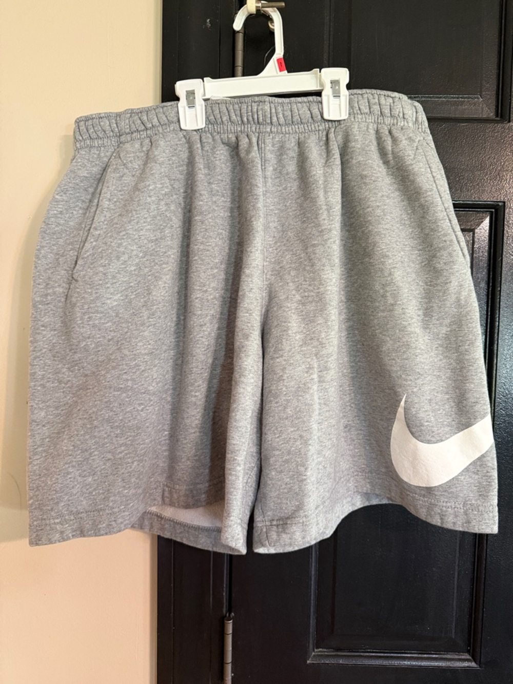 Nike Grey Athletic Shorts with White Swoosh